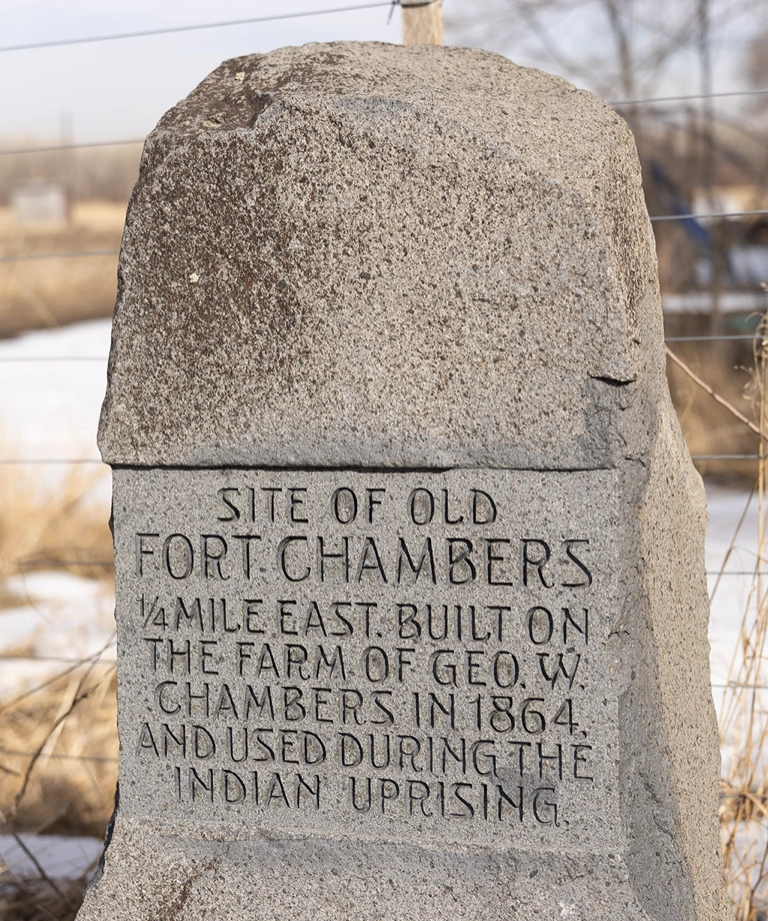 The stone Fort Chambers marker reading Site of Old Fort Chambers